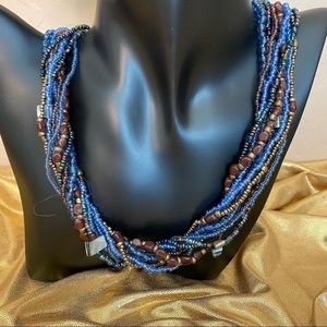 Multi-stranded Blue and Brown Beaded Necklace. beaded Loop clasp.